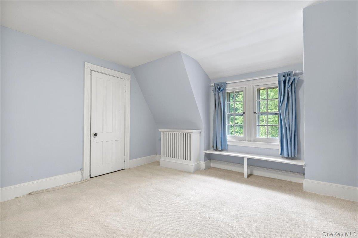 655 North Street Harrison, NY 10580 - Photo 28 of 48 an empty room with a window