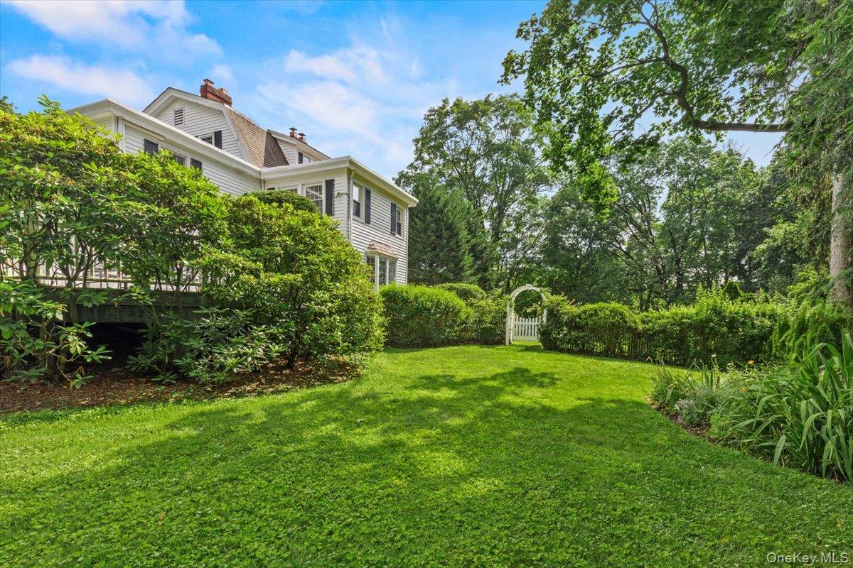 655 North Street Harrison, NY 10580 - Photo 41 of 48 a front view of a house with a yard