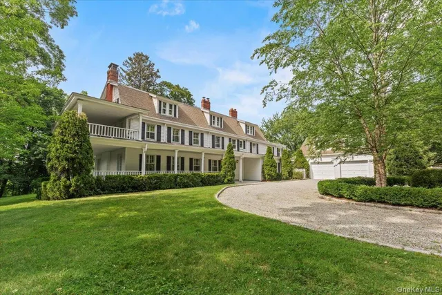 a very nice looking house with a yard