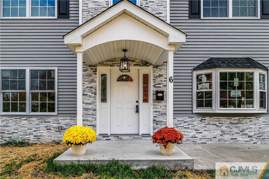 6 Dayton Road Edison, NJ 08817 - Photo 2 of 38 a front view of a house with garden