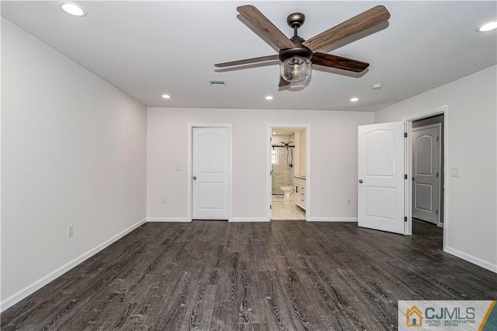 6 Dayton Road Edison, NJ 08817 - Photo 24 of 38 a view of an empty room with wooden floor