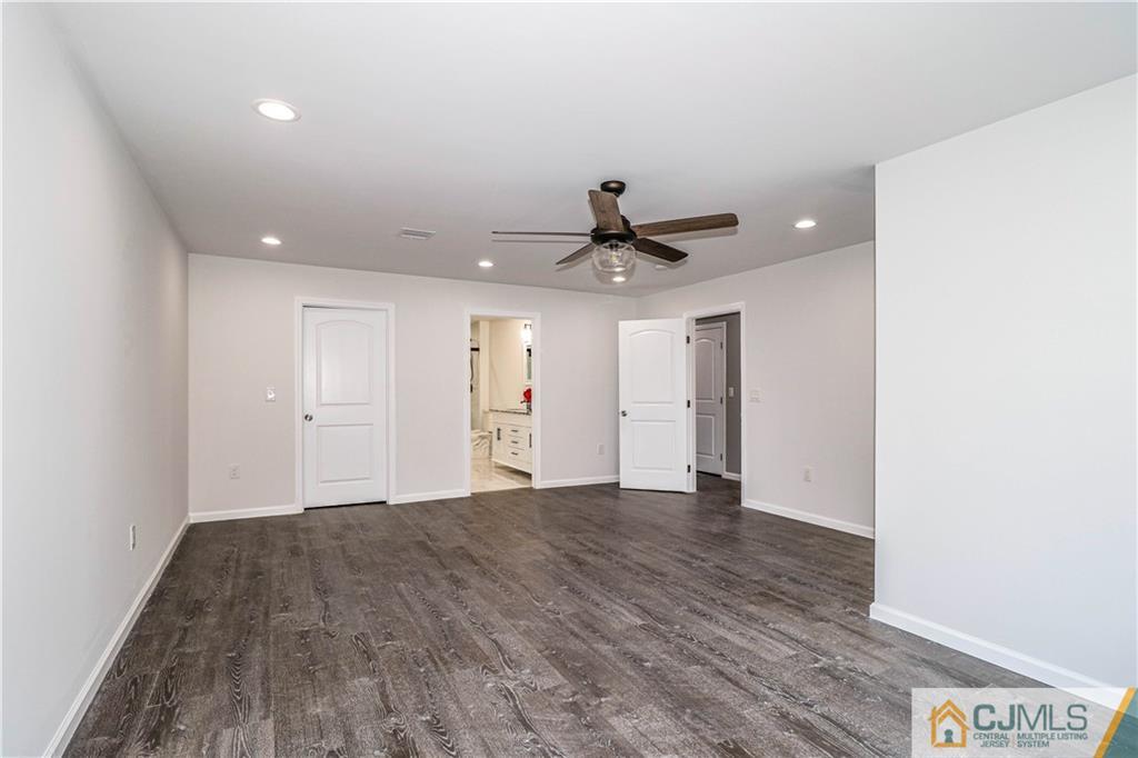 6 Dayton Road Edison, NJ 08817 - Photo 25 of 38 a view of empty room with wooden floor and ceiling fan