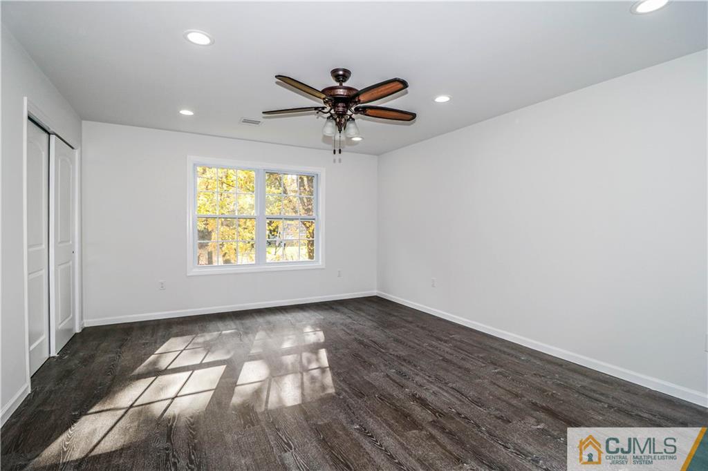 6 Dayton Road Edison, NJ 08817 - Photo 29 of 38 an empty room with windows and fan
