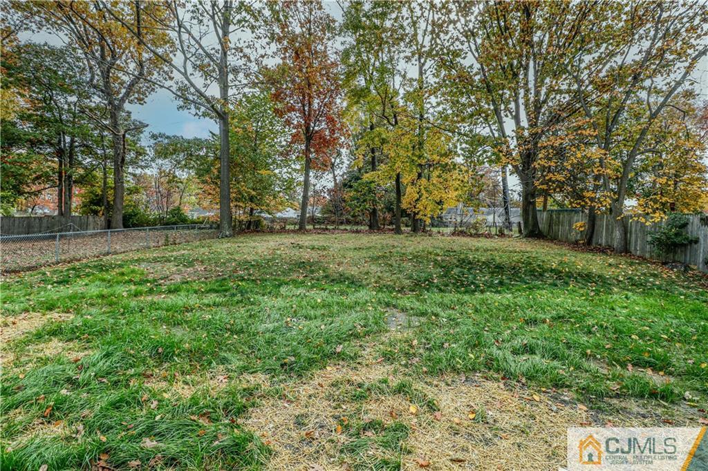 6 Dayton Road Edison, NJ 08817 - Photo 38 of 38 a view of a grassy field with trees