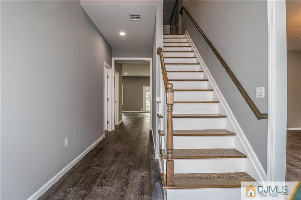 6 Dayton Road Edison, NJ 08817 - Photo 6 of 38 a view of entryway and hall with wooden floor