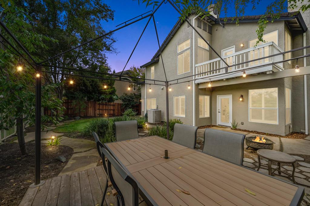 113 Ballast Way Folsom, CA 95630 - Photo 32 of 42 a view of a patio with couches table and chairs and potted plants