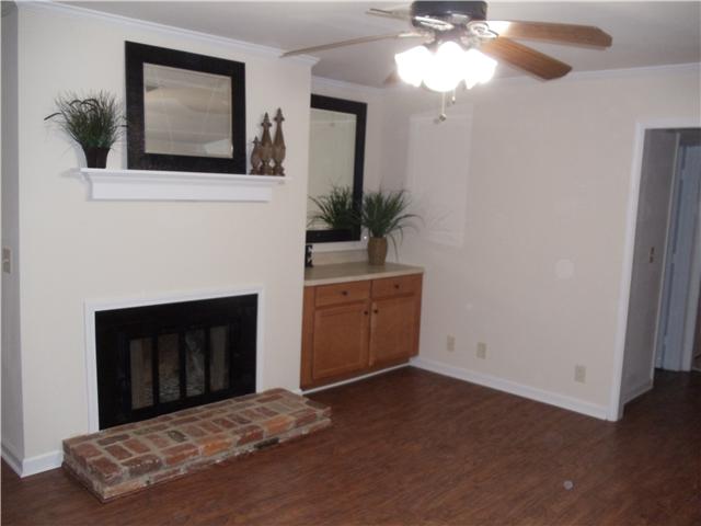 1081 General George Patton Road Nashville, TN 37221 - Photo 4 of 14 This is the den that features a wood burning fireplace and extra storage.