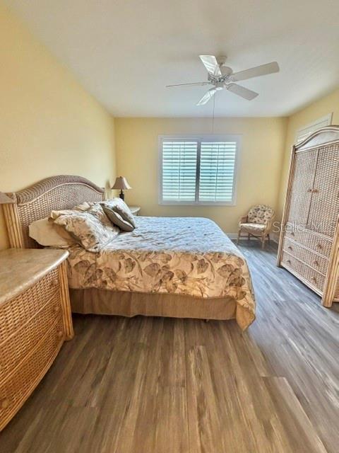 13413 Gasparilla Road, Unit 304 Placida, FL 33946 - Photo 13 of 28 a bedroom with a bed and a dresser