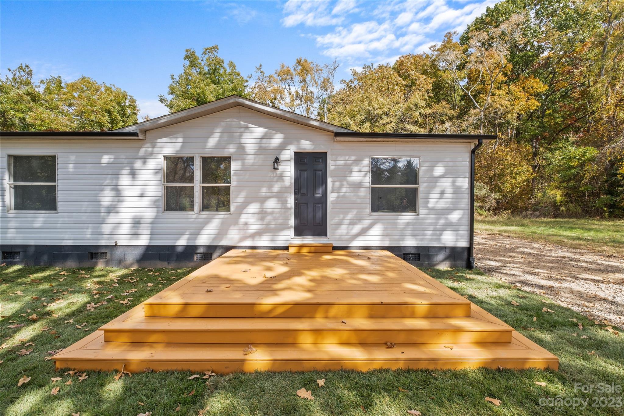 11341 Flowes Store Road Midland, NC 28107 - Photo 2 of 23 a front view of house with yard