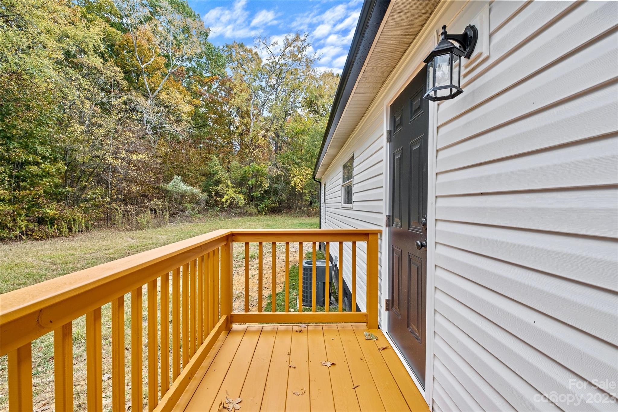 11341 Flowes Store Road Midland, NC 28107 - Photo 21 of 23 a view of balcony with wooden floor