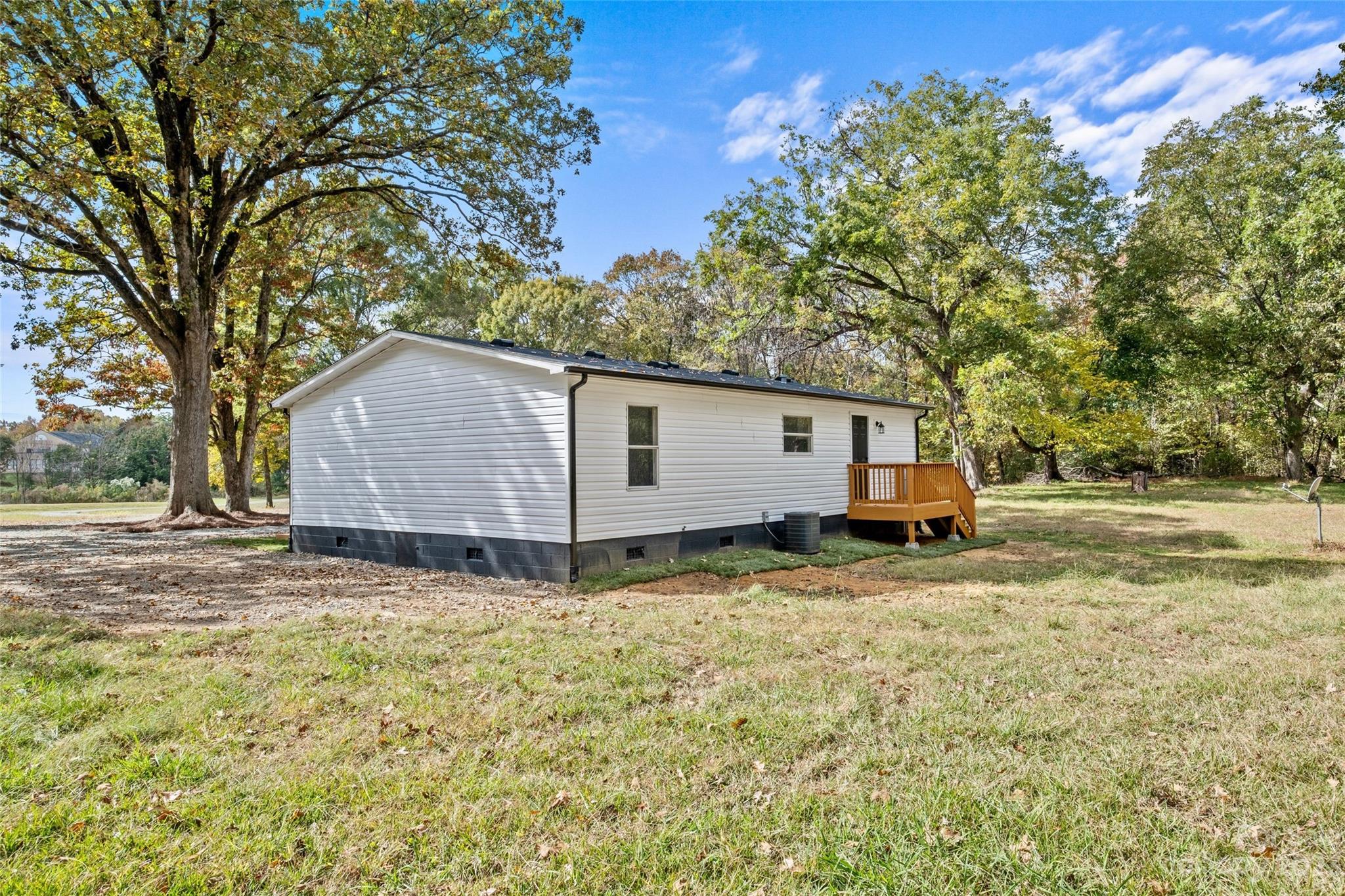 11341 Flowes Store Road Midland, NC 28107 - Photo 23 of 23 a view of a house with backyard