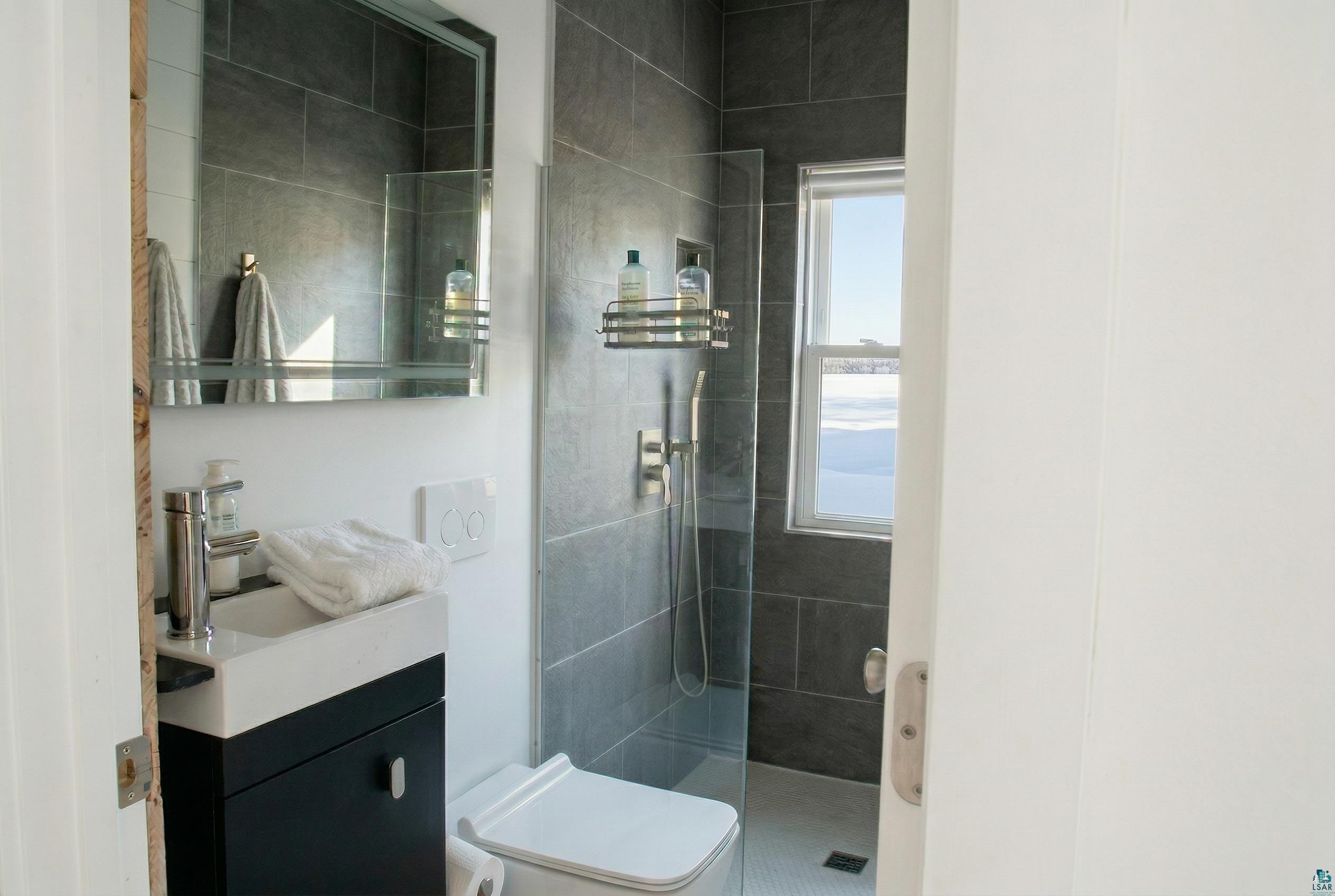 4107 B Lake Park Road Ashland, WI 54806 - Photo 20 of 23 Full bath with vanity and walk in shower