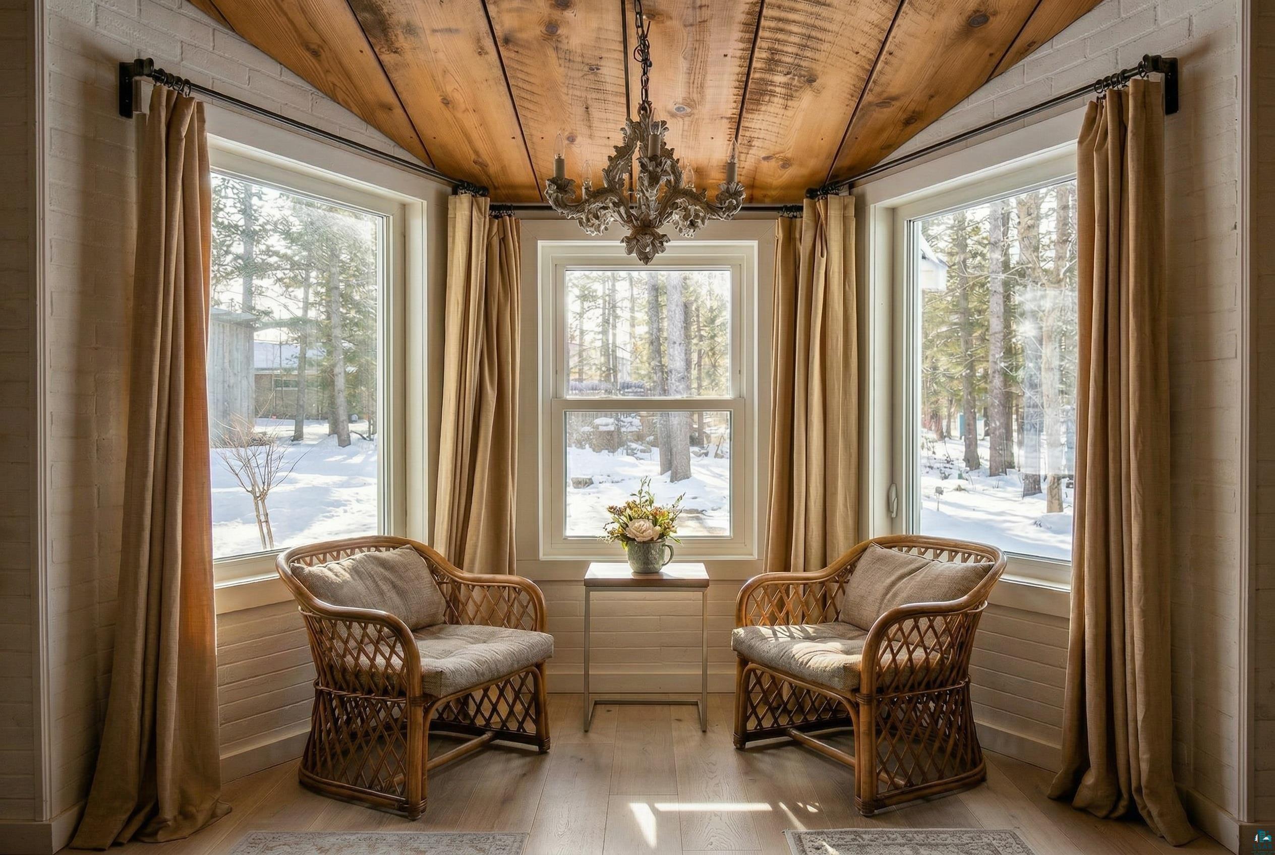 4107 B Lake Park Road Ashland, WI 54806 - Photo 10 of 15 Breakfast nook with a vaulted wooden ceiling, wood-type flooring, hanging lights, and healthy amount of natural light