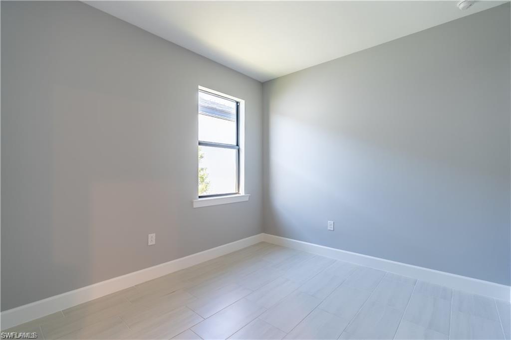 20207 Napa Loop Estero, FL 33928 - Photo 19 of 42 an empty room with a window