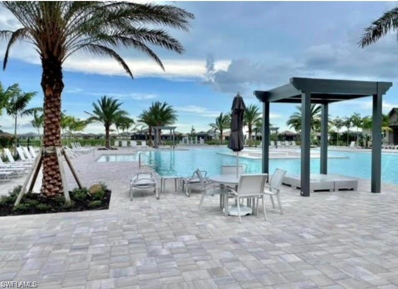 20207 Napa Loop Estero, FL 33928 - Photo 34 of 42 a outdoor space with lots of palm trees