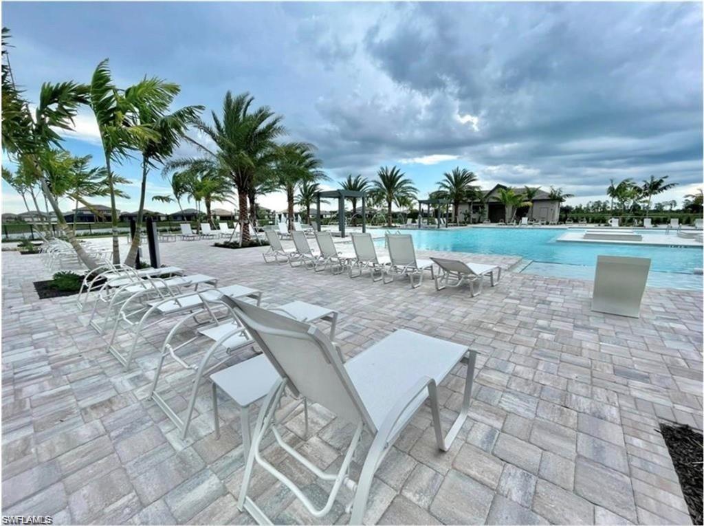 20207 Napa Loop Estero, FL 33928 - Photo 35 of 42 a view of outdoor space with garden