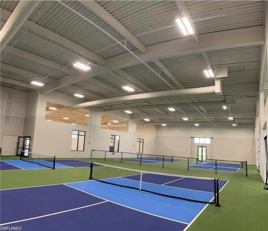 20207 Napa Loop Estero, FL 33928 - Photo 38 of 42 a view of a room with gym equipment