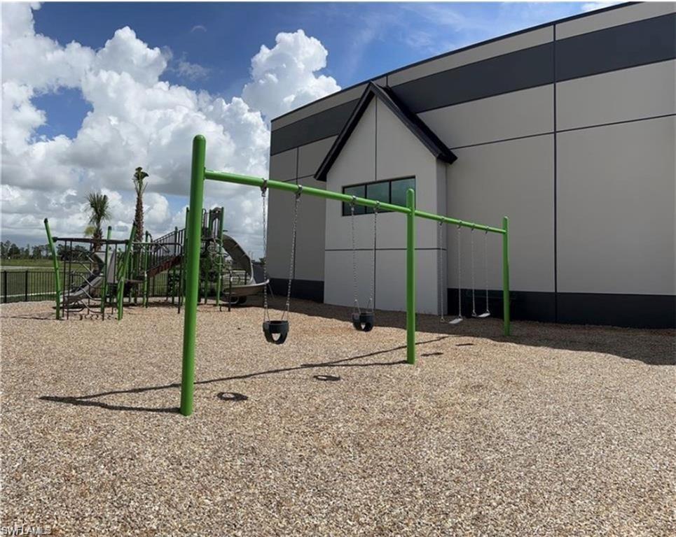 20207 Napa Loop Estero, FL 33928 - Photo 40 of 42 a house with a street