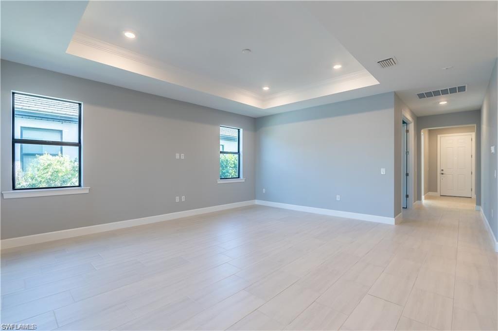 20207 Napa Loop Estero, FL 33928 - Photo 7 of 42 an empty room with windows and closet