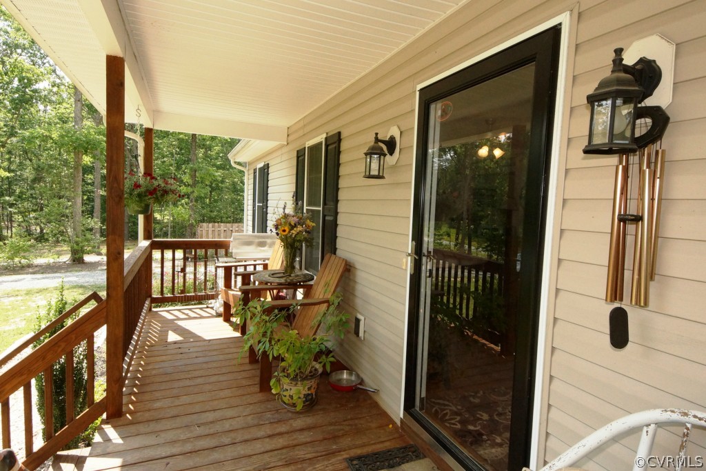 40 Winding Ridge Way Bumpass, VA 23024 - Photo 12 of 16 a view of balcony with couch
