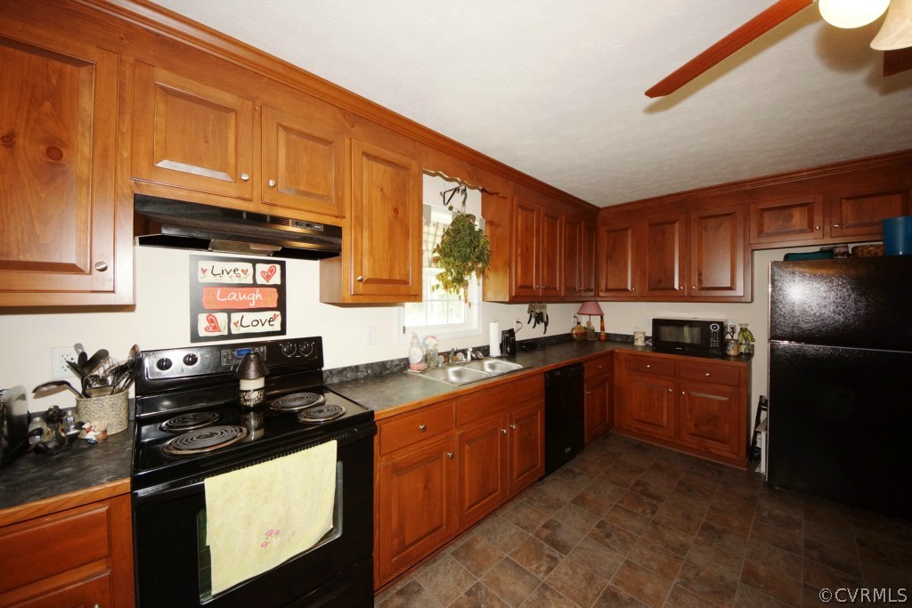 40 Winding Ridge Way Bumpass, VA 23024 - Photo 14 of 16 a kitchen with granite countertop stainless steel appliances and wooden cabinets