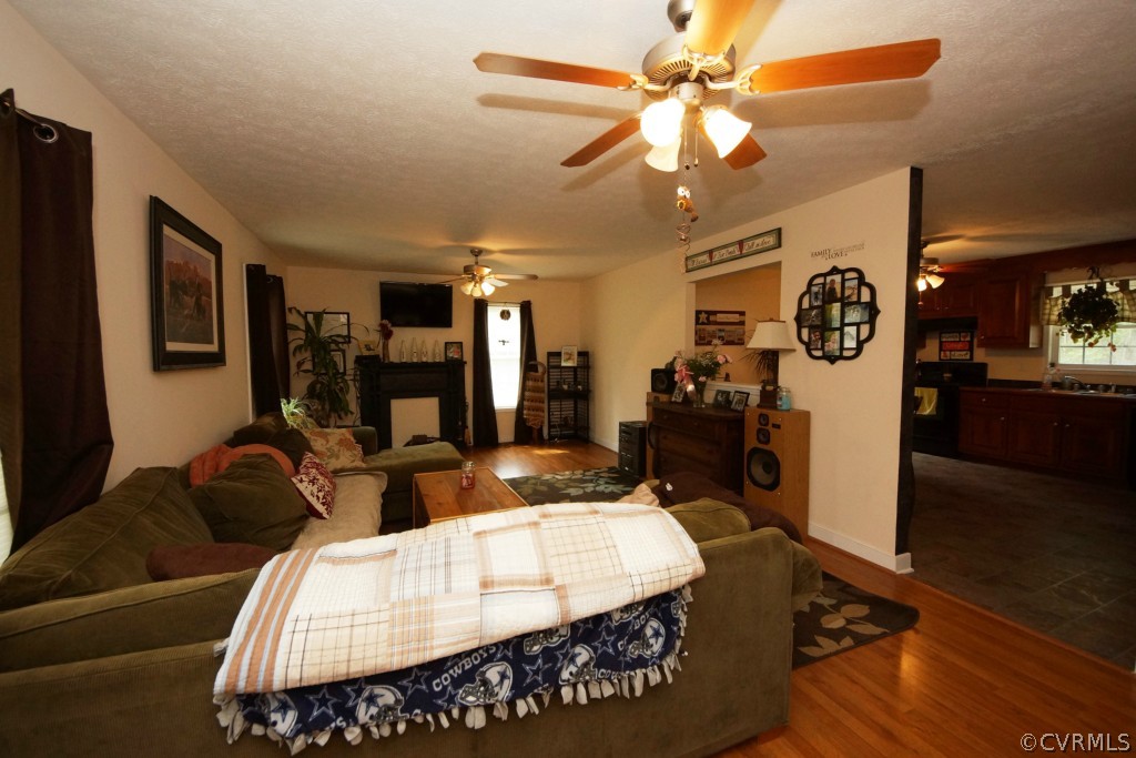 40 Winding Ridge Way Bumpass, VA 23024 - Photo 5 of 16 a bed room with furniture and a chandelier