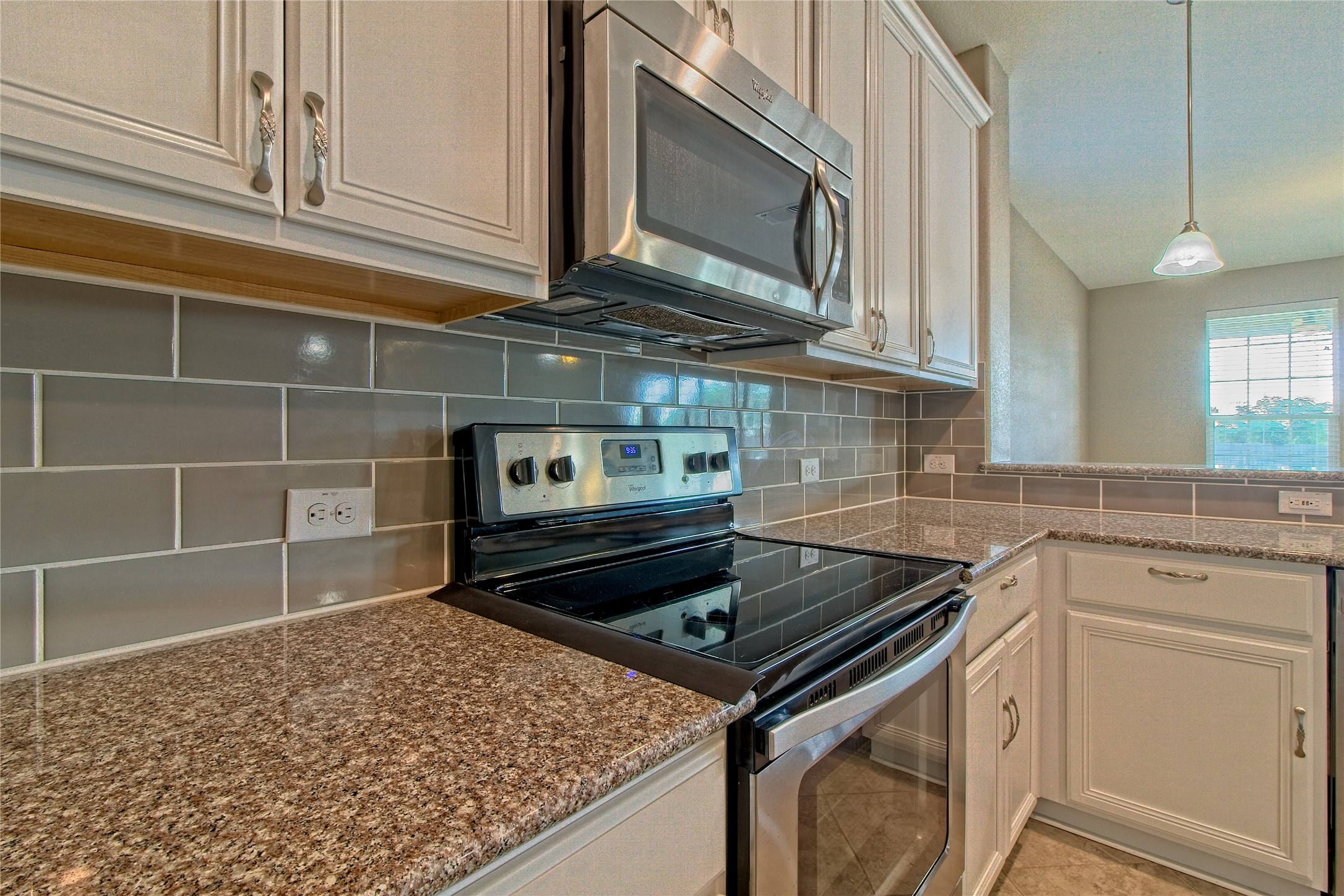 31443 Kingsway Road Georgetown, TX 78628 - Photo 15 of 40 A well-appointed kitchen showcasing durable granite counters and modern stainless steel appliances.