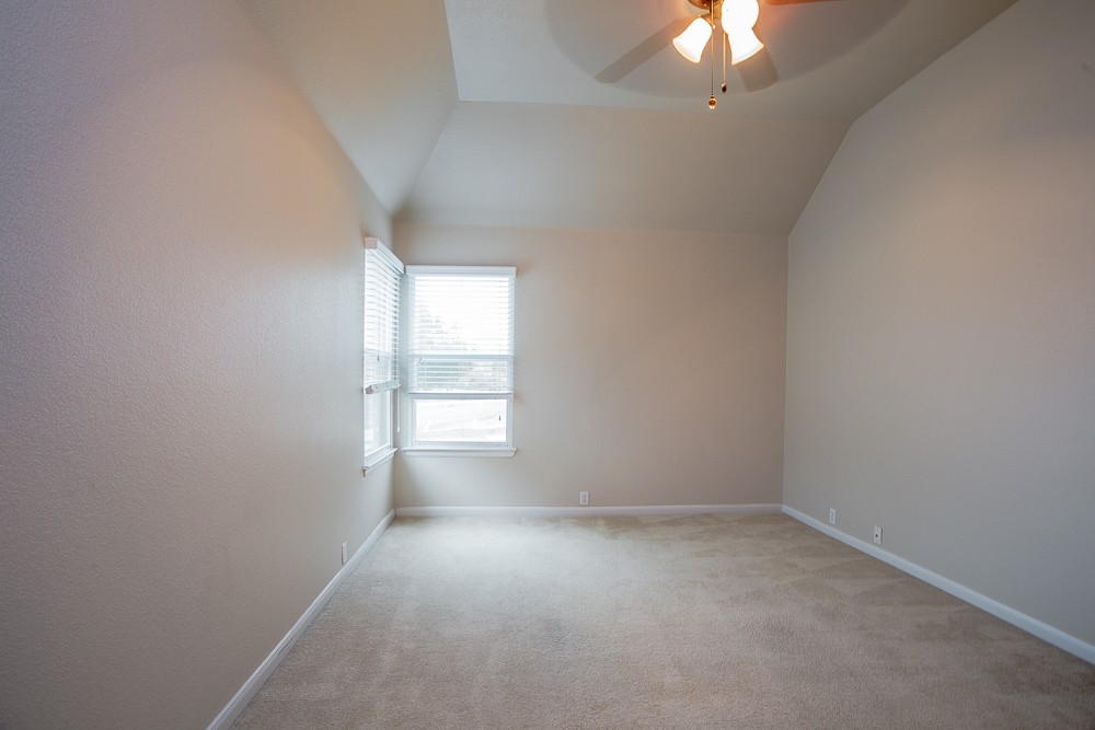 14812 Avery Ranch Boulevard, Unit 28 Austin, TX 78717 - Photo 14 of 21 an empty room with a window