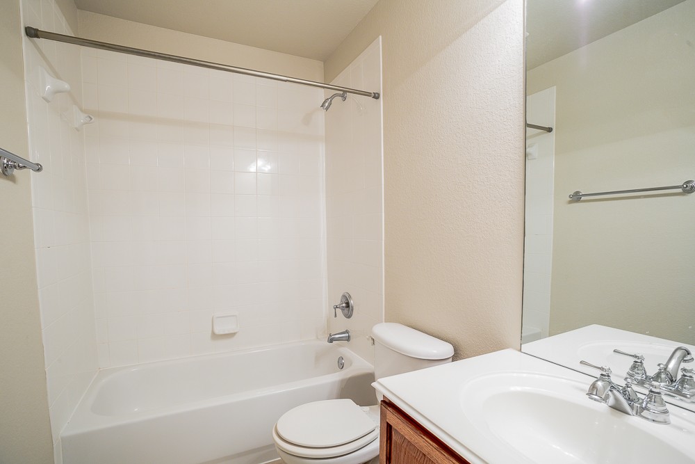 14812 Avery Ranch Boulevard, Unit 28 Austin, TX 78717 - Photo 16 of 21 a bathroom with a sink toilet and shower