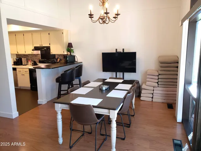 a view of a chairs and tables in the patio