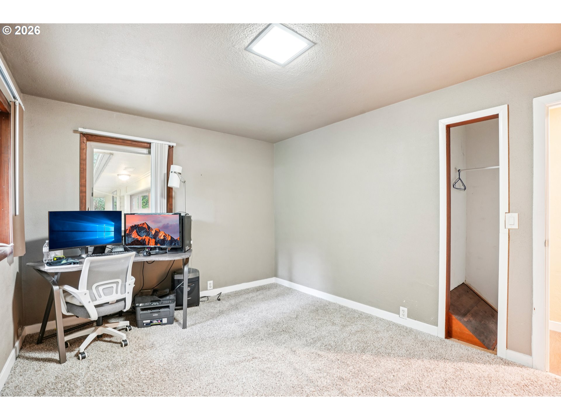 12444 Southwest 57th Avenue Portland, OR 97219 - Photo 15 of 44 a workspace with furniture and a window
