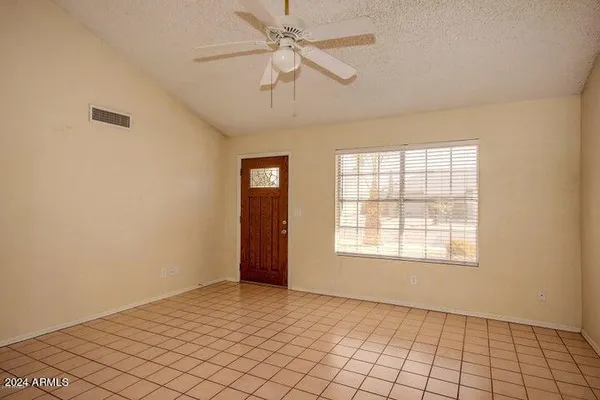 a view of an empty room and window