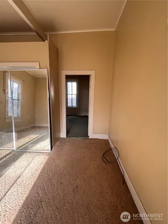a view of a livingroom with a staircase