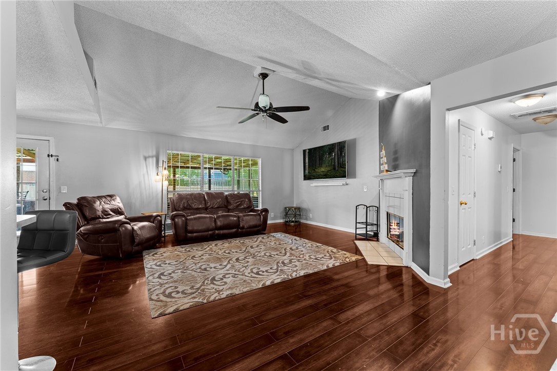 219 Oxford Circle Rincon, GA 31326 - Photo 7 of 31 Beautiful Black Walnut Laminate flooring throughout