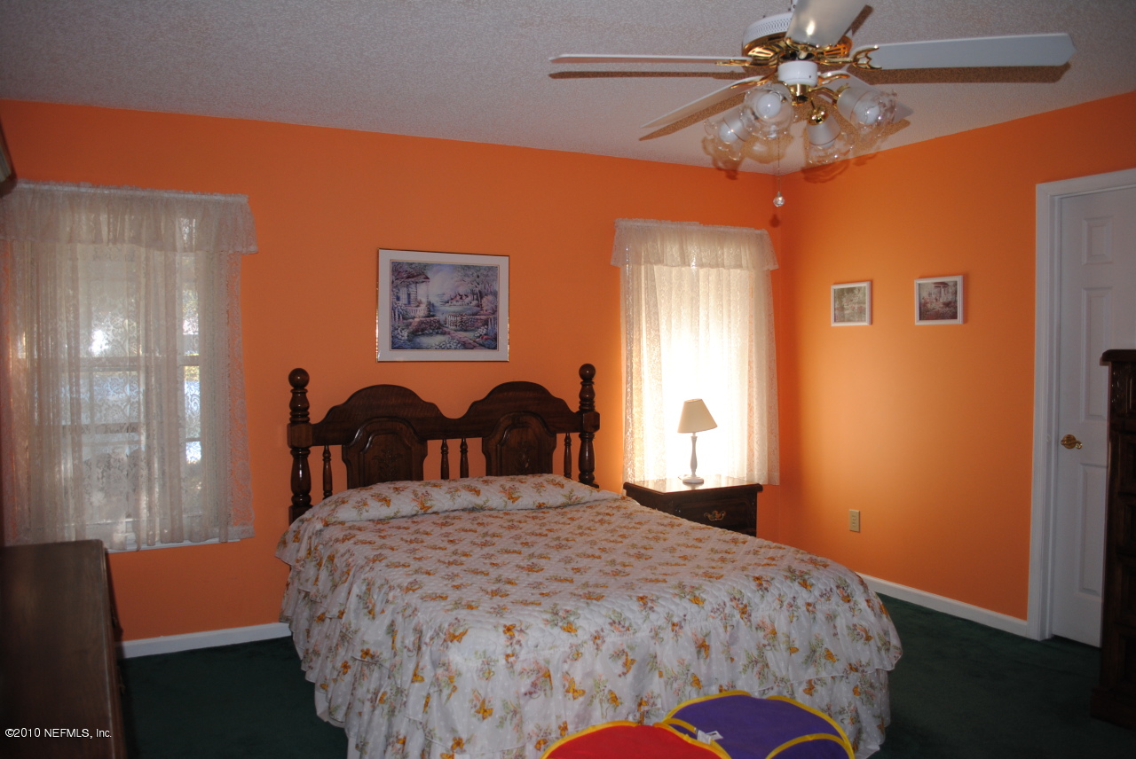 11883 Swooping Willow Road Jacksonville, FL 32223 - Photo 11 of 20 Master bedroom