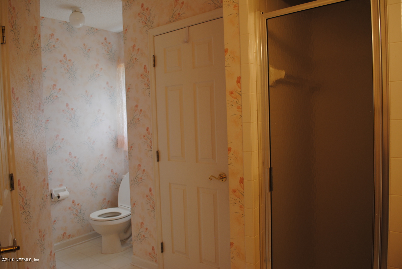 11883 Swooping Willow Road Jacksonville, FL 32223 - Photo 13 of 20 Master bath has lots of light and a