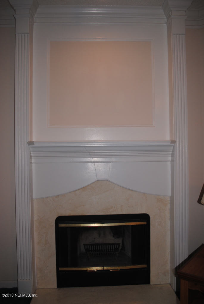 11883 Swooping Willow Road Jacksonville, FL 32223 - Photo 17 of 20 Beautiful fireplace with molding and