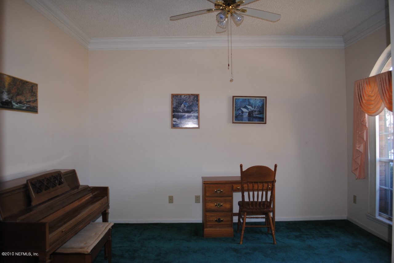 11883 Swooping Willow Road Jacksonville, FL 32223 - Photo 2 of 20 Living Room can be used as a home office