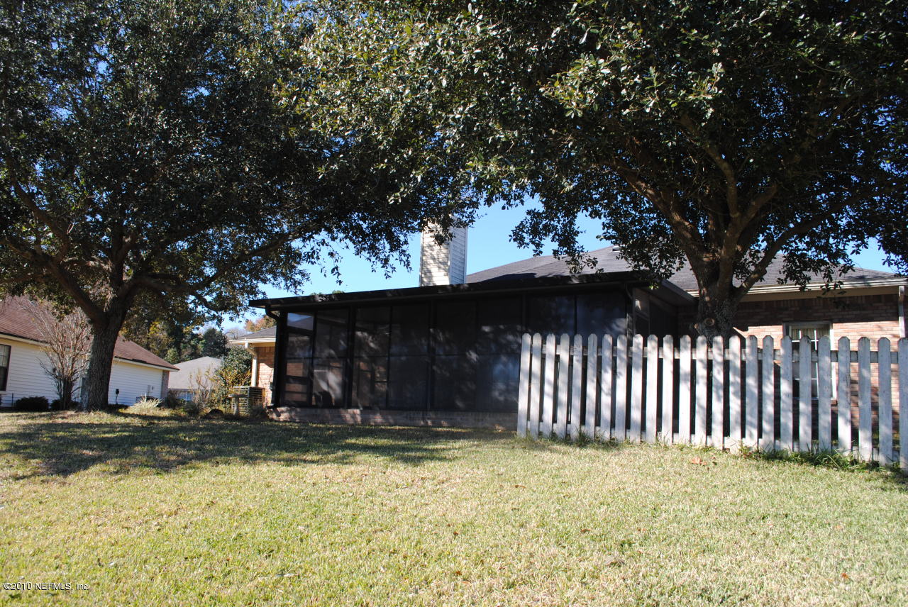 11883 Swooping Willow Road Jacksonville, FL 32223 - Photo 8 of 20 Lots of shade in the backyard