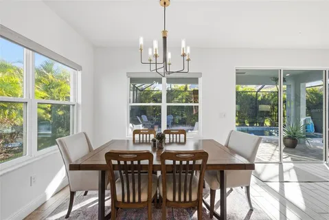 a bathroom with a sink a mirror and a shower