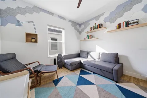 a children room with furniture