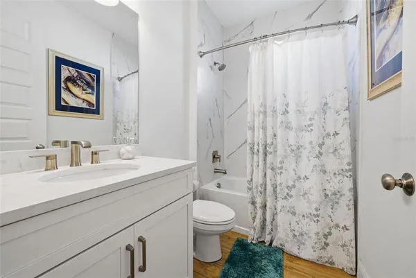 an aerial view of a house with outdoor space