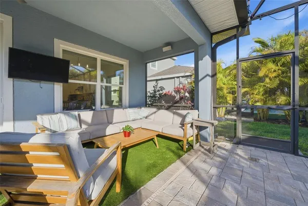 a picture of a room with a floor to ceiling window