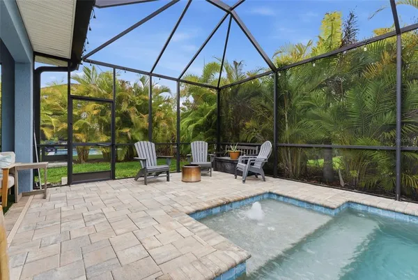 a view of a swimming pool with a garden
