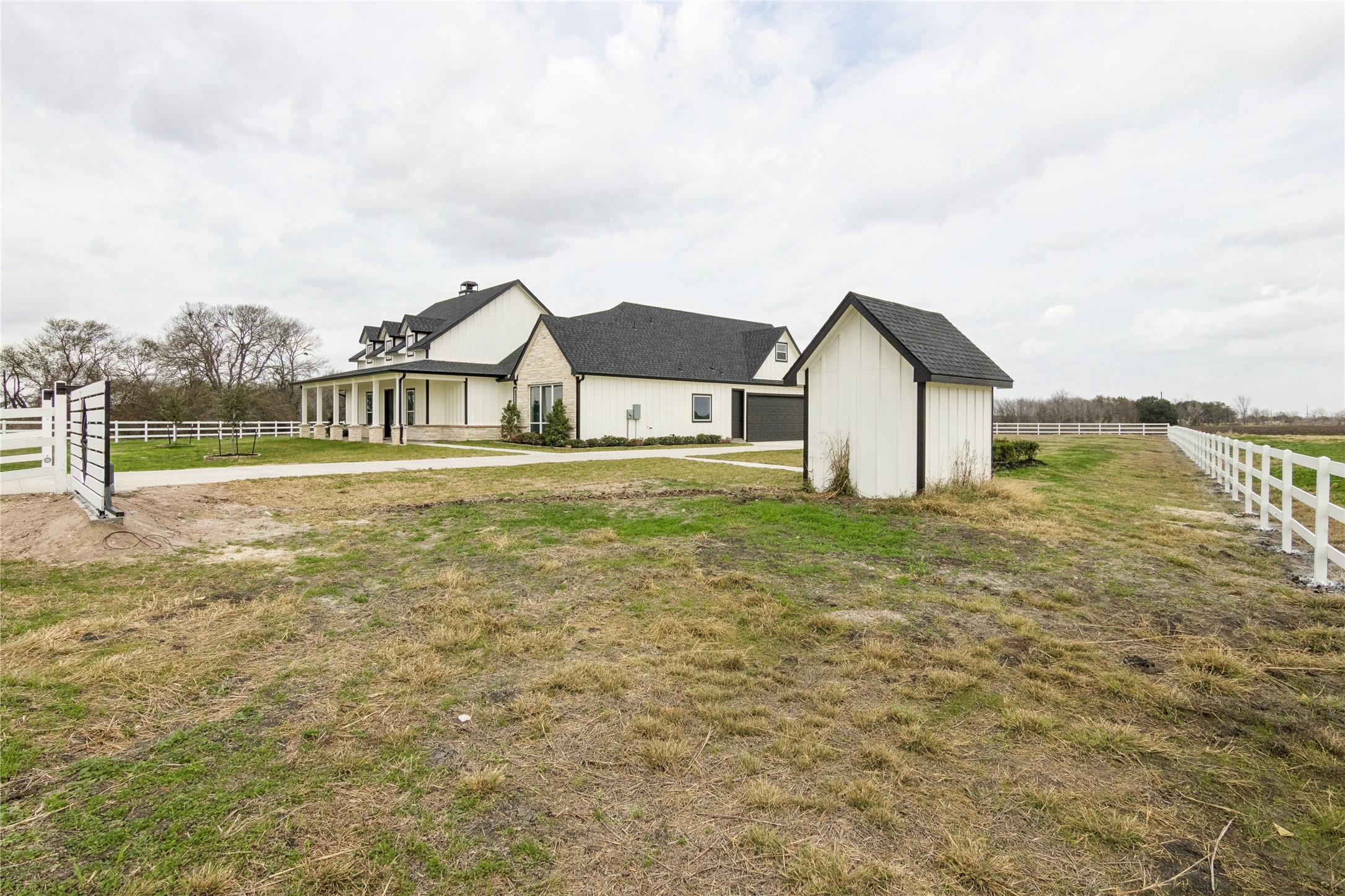 5766 Ward Bend Road Sealy, TX 77474 - Photo 41 of 45 a view of a house with a yard and sitting area