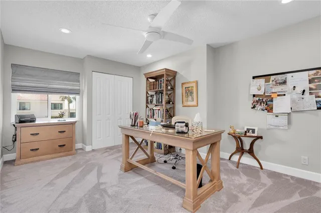 a view of a workspace with furniture