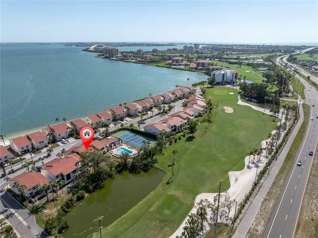 an aerial view of a houses with outdoor space