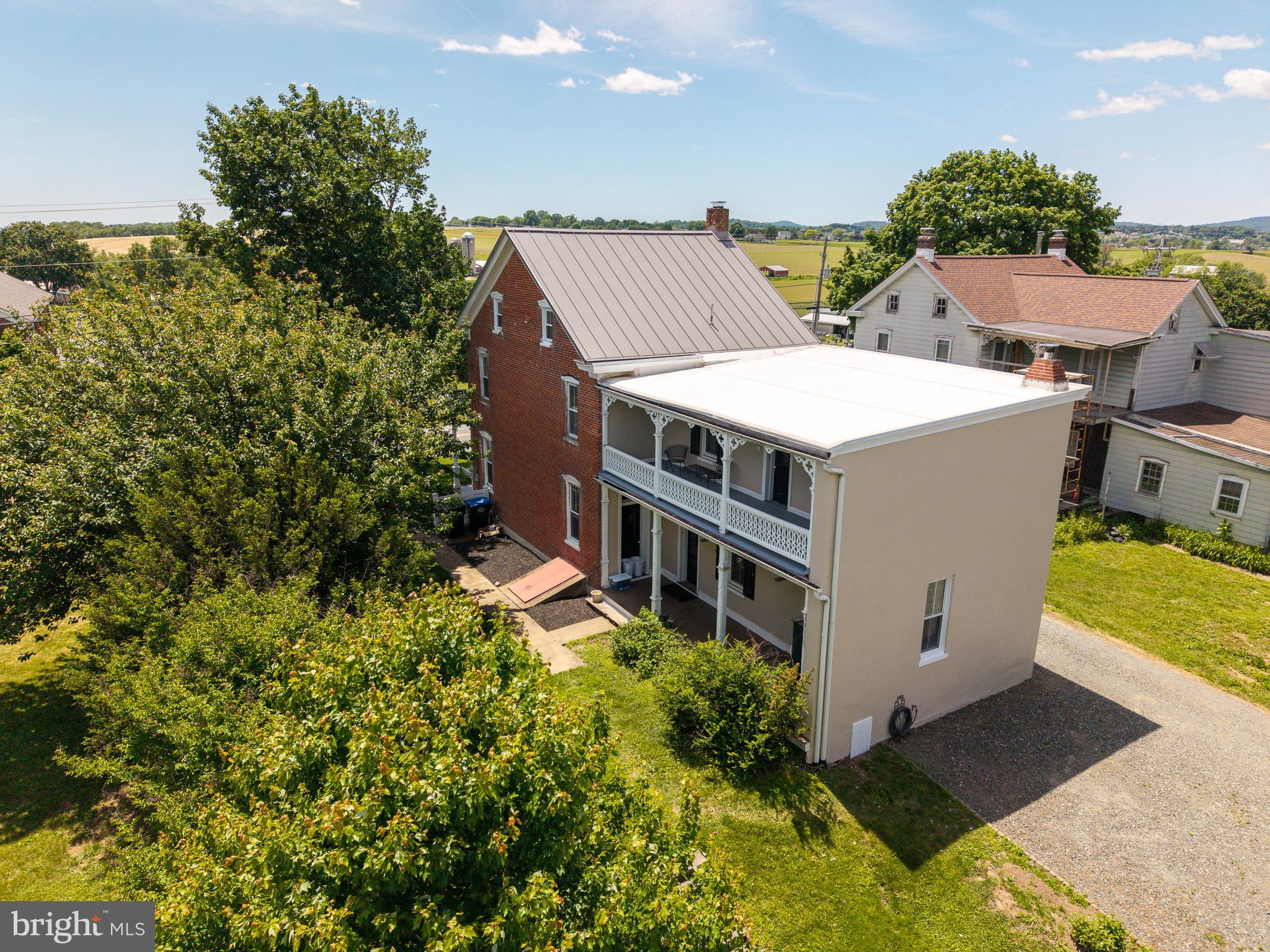 225 Niantic Road Barto, PA 19504 - Photo 15 of 82 an aerial view of a house with a yard potted plants and large tree