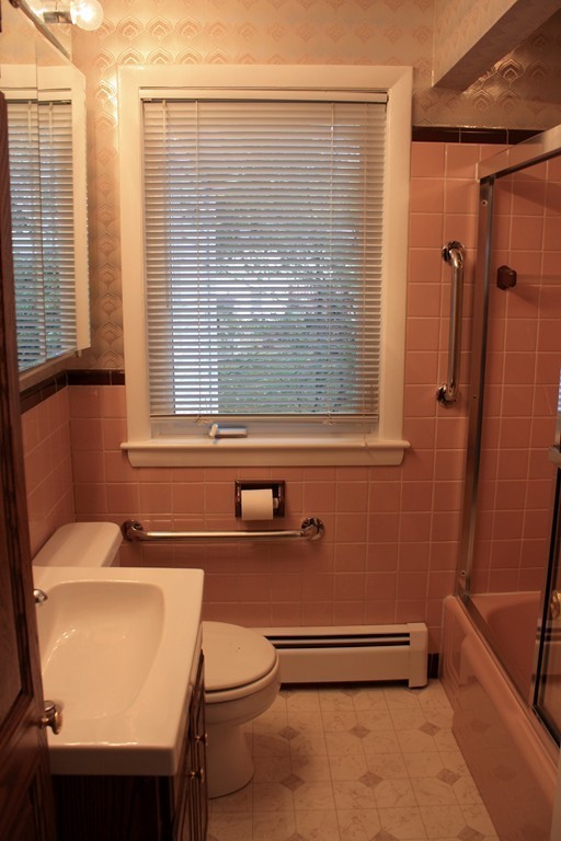 74 Yerxa Road Arlington, MA 02474 - Photo 13 of 16 a bathroom with a sink a toilet and a shower