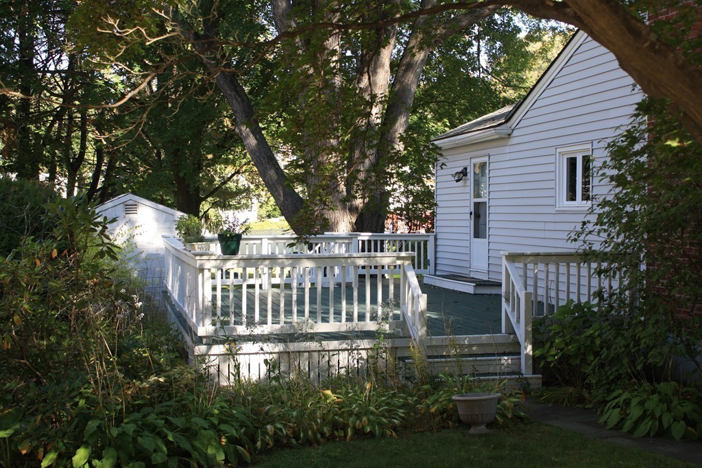 74 Yerxa Road Arlington, MA 02474 - Photo 15 of 16 a view of a deck with a yard